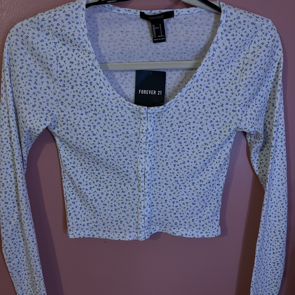 Super cute cardigan long sleeve shirt with hook up front and dainty flower print